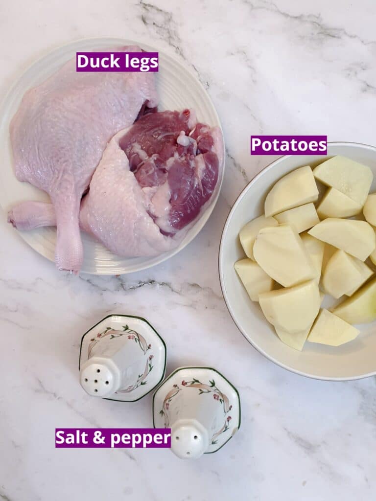 Ingredients for roasted duck legs and potatoes.
