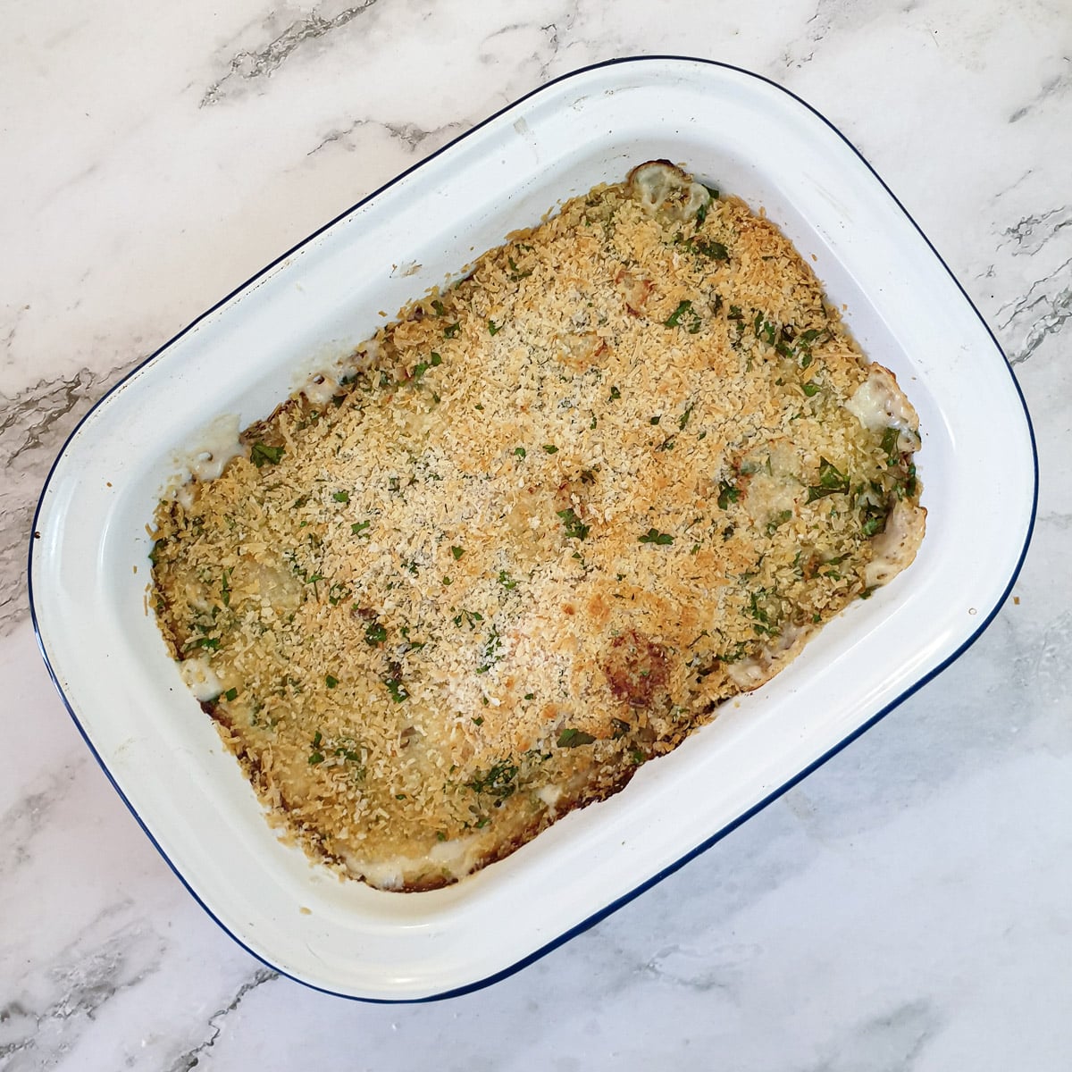 A baked dish of salmon and asparagus gratin.