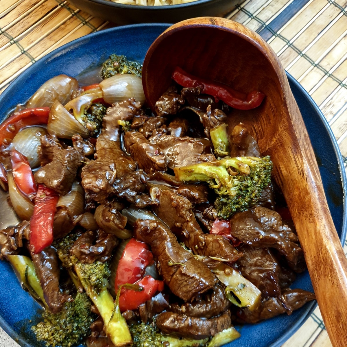 Szechuan beef stirfry with noodles Foodle Club
