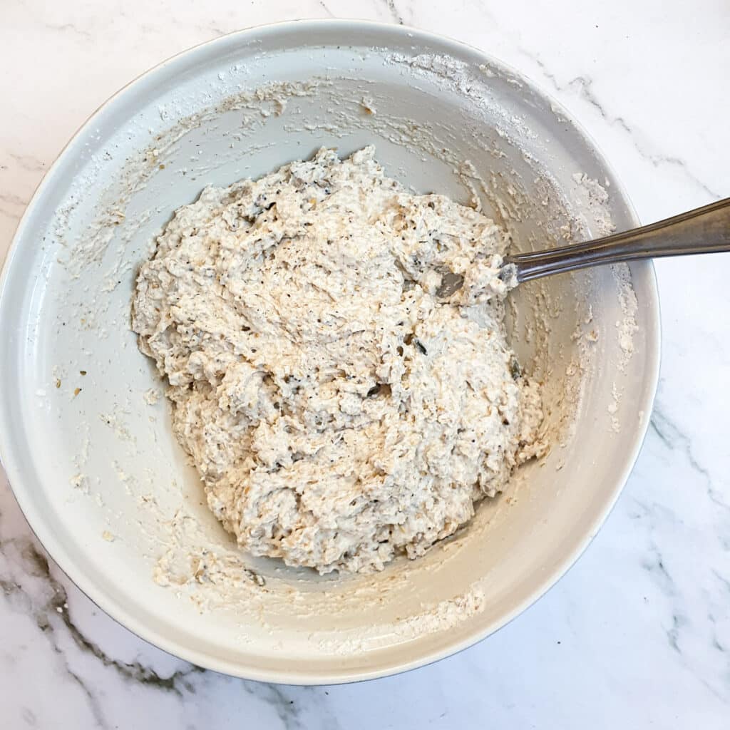 Seeds mixed through the seeded bread roll dough.