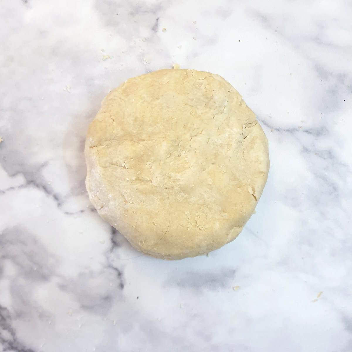 A ball of dough on a table.