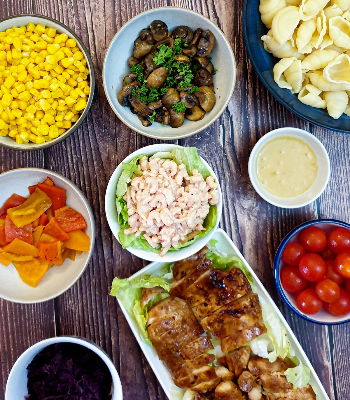 A selecction of dishes from a typical pasta salad bar.