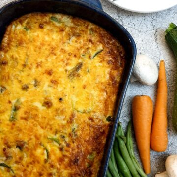 Closeup of a dish of crustless vegetable quiche.