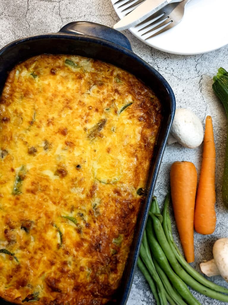 Closeup of a dish of crustless vegetable quiche.