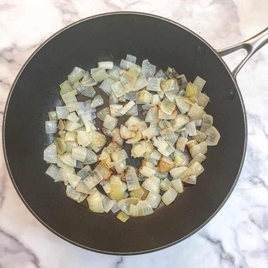 Onions in a frying pan.