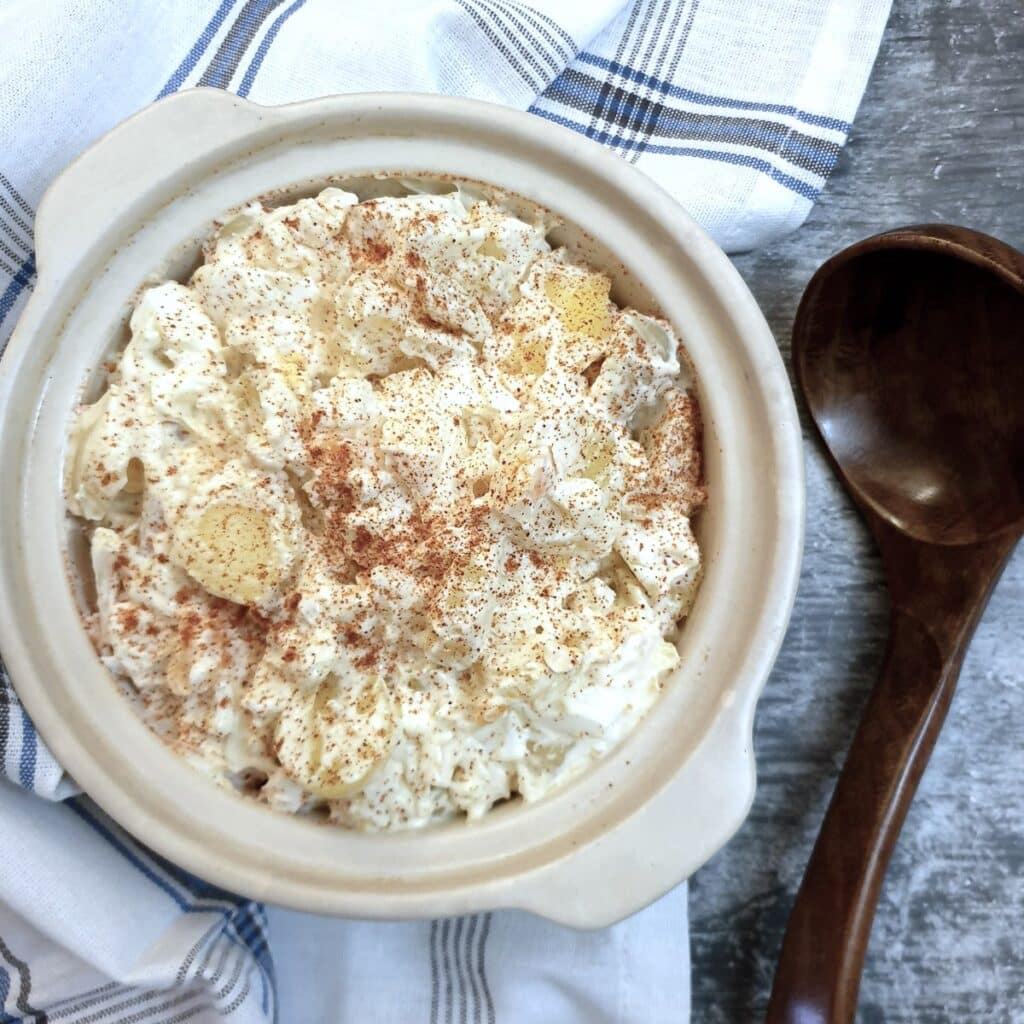 Overhead shot of a dish of potato and egg salad.