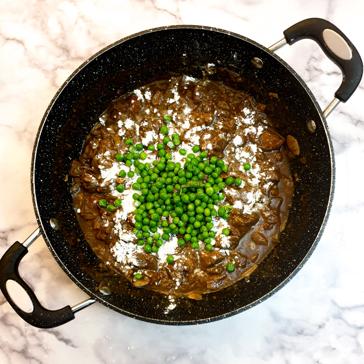 Peas and flour added to the lamb pie filling.