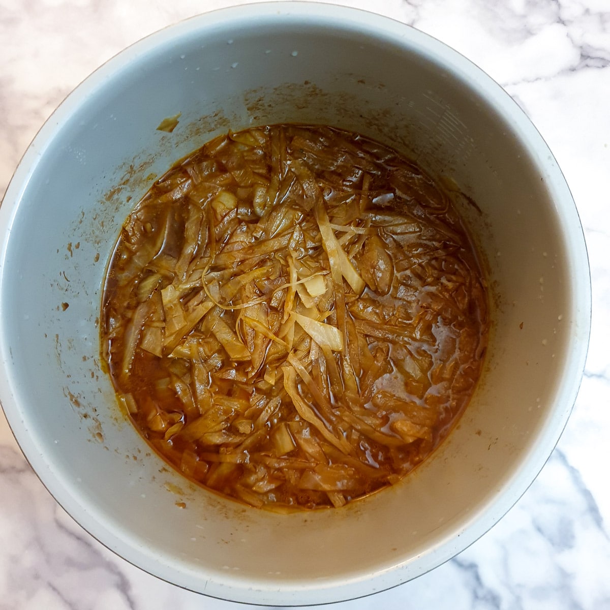 Cooked cabbage in the beef bredie.