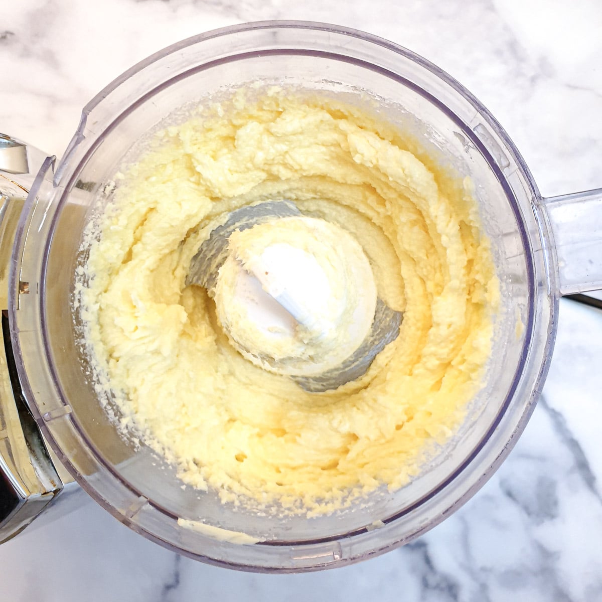 Butter and suger creamed together in a food processor.