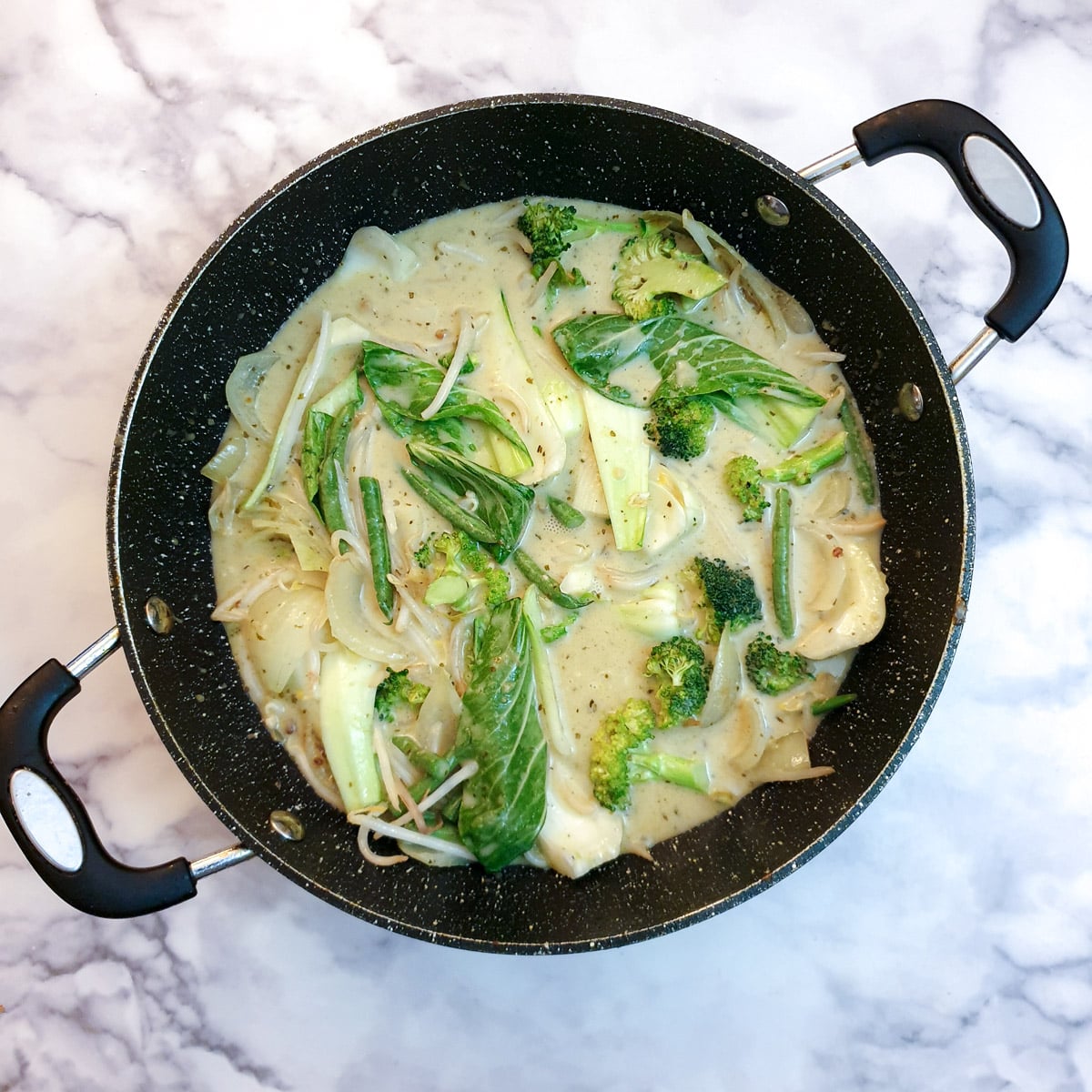 Green vegetables added to the curry.