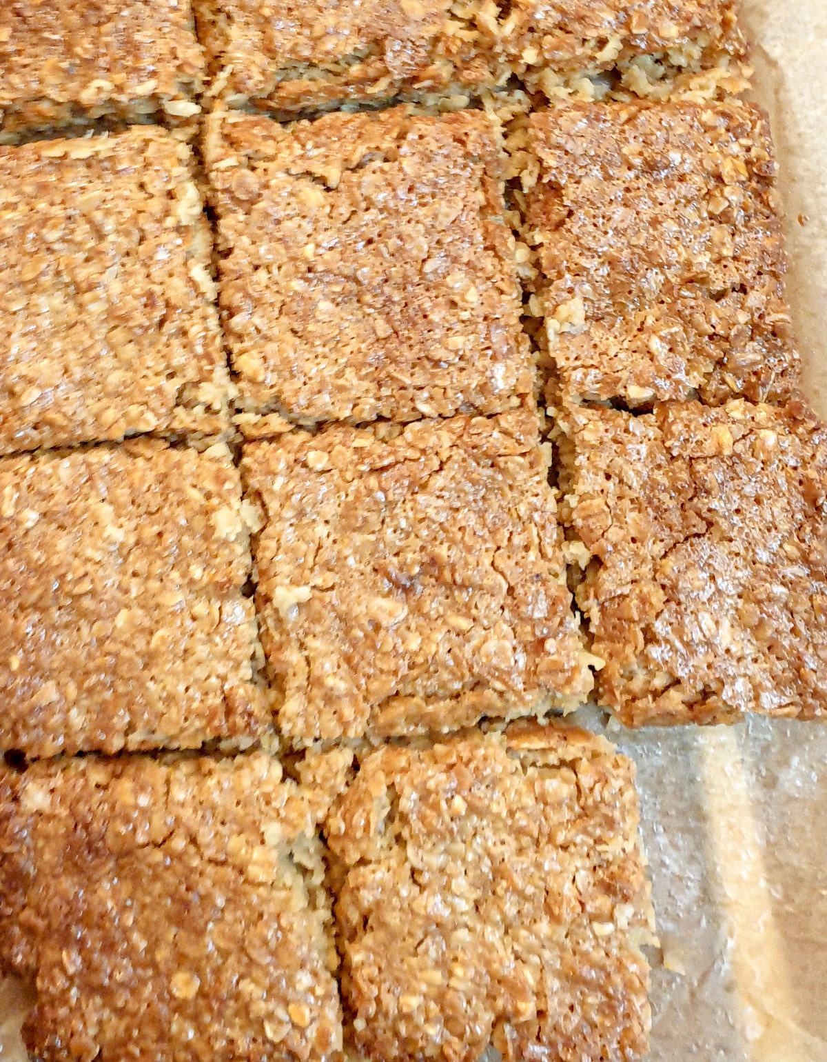 Close up of flapjacks cut into squares.