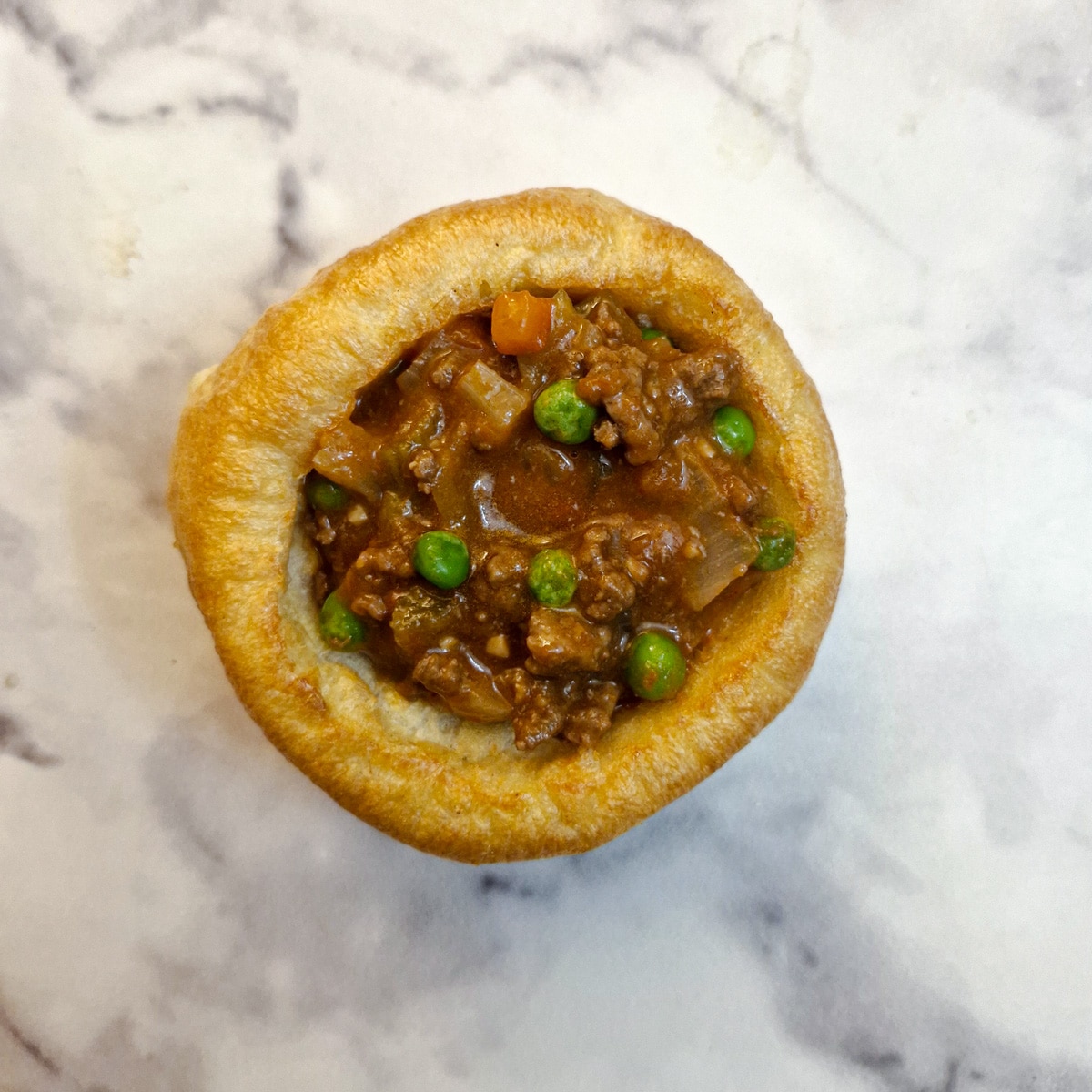 A Yorkshire pudding filled with cooked savoury mince.