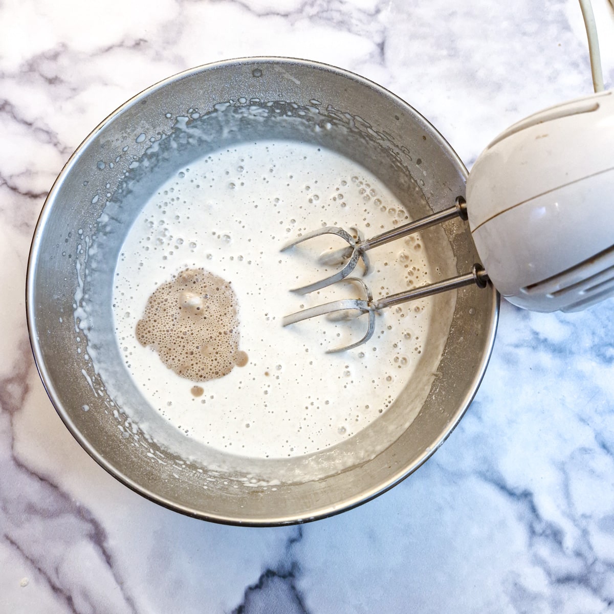 Activated yeast added to a flour and water mixture.