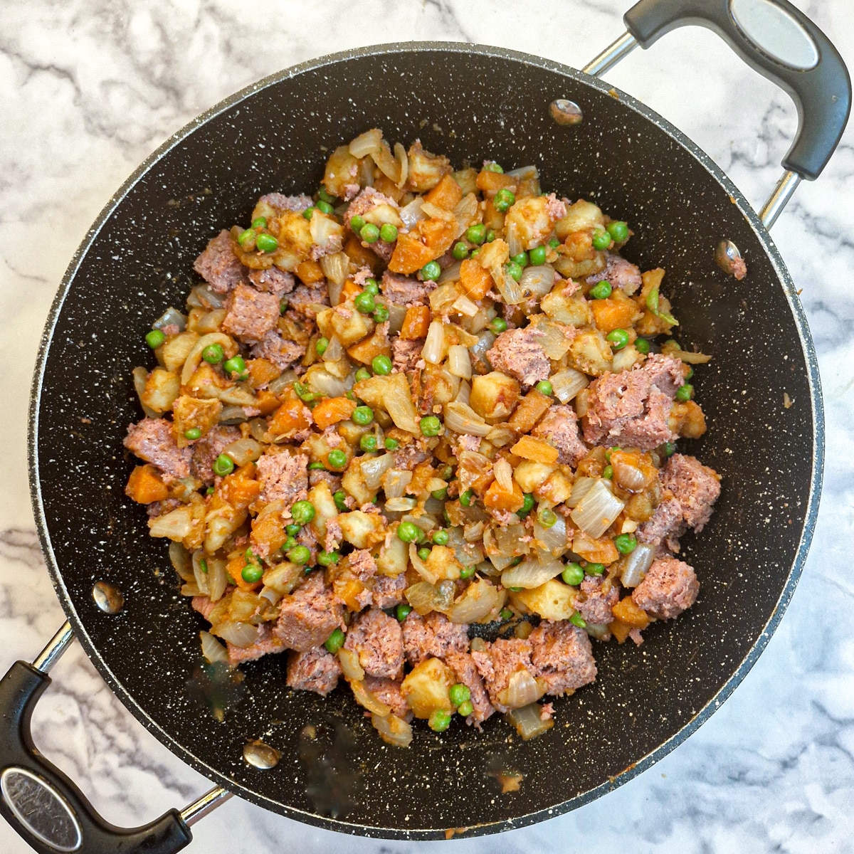 Cubes of corned beef added to the pie filling.