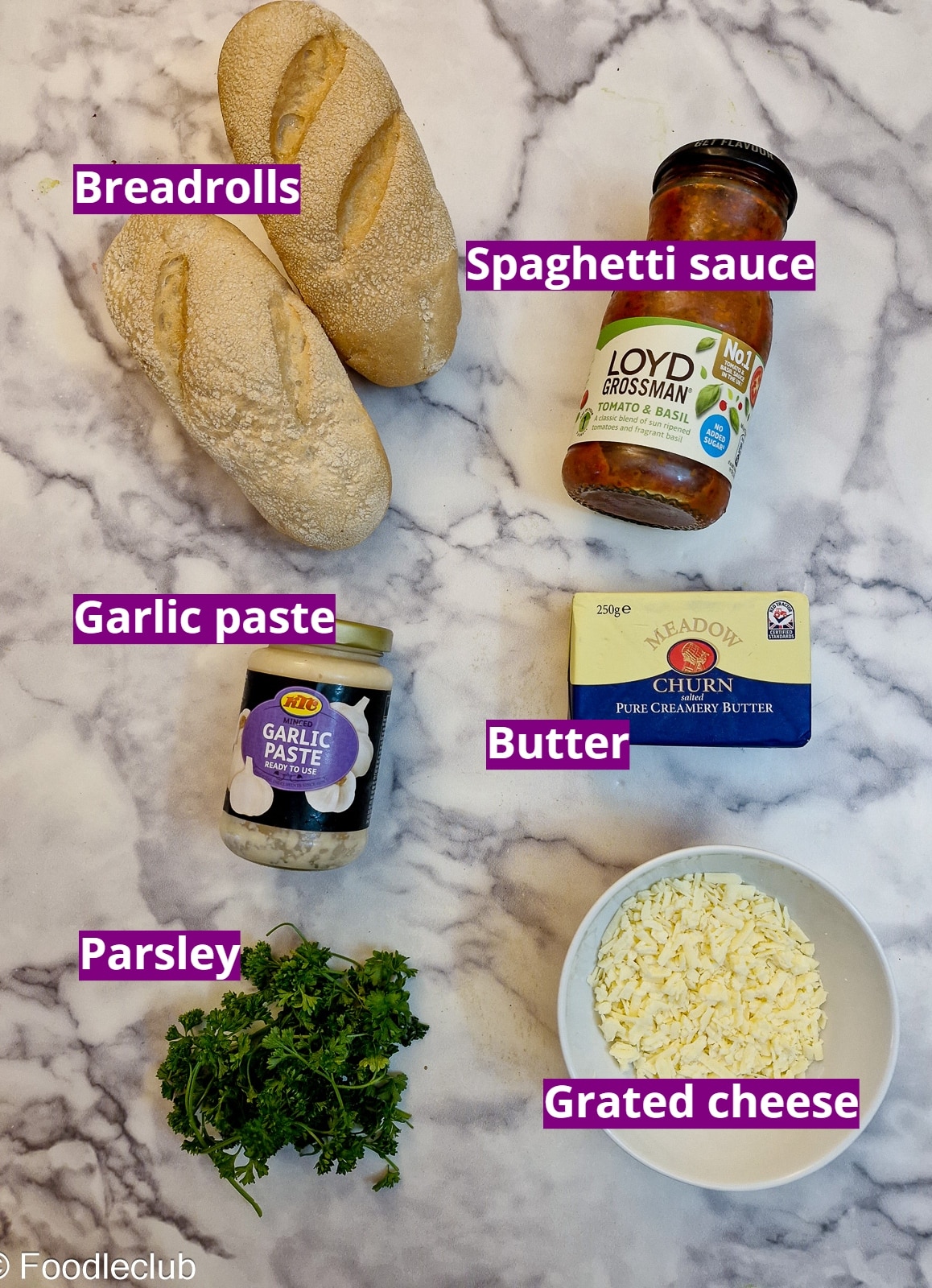 Ingredients for cheesy garlic baguettes.