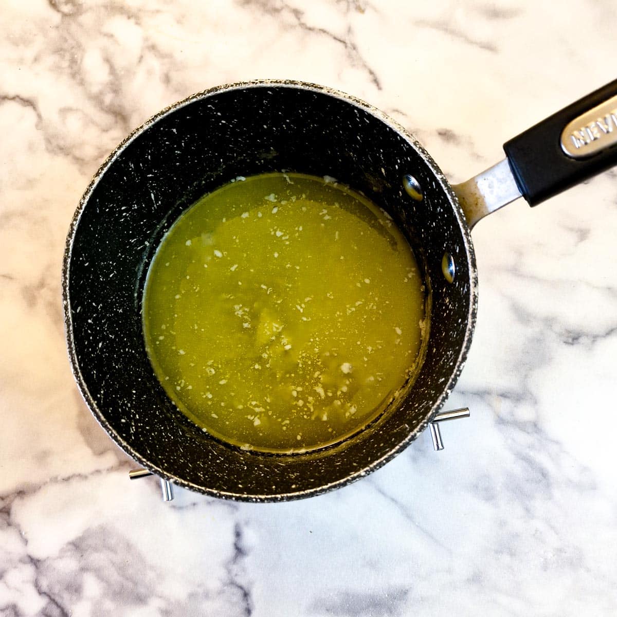 Butter melting in a saucepan.