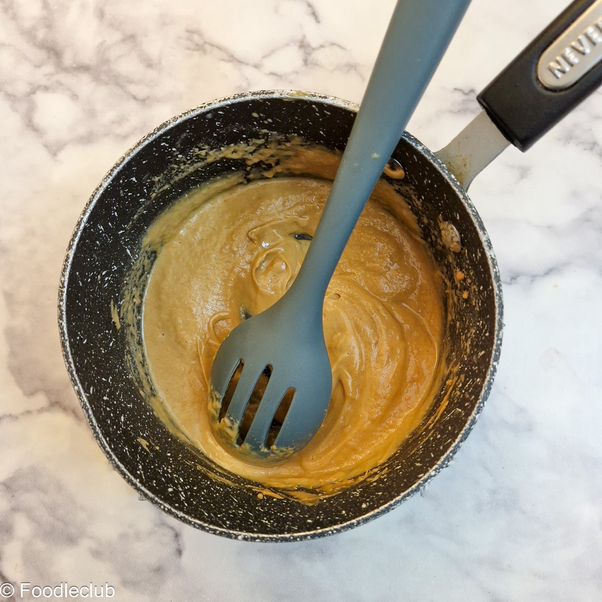 Satay sauce in a saucepan.