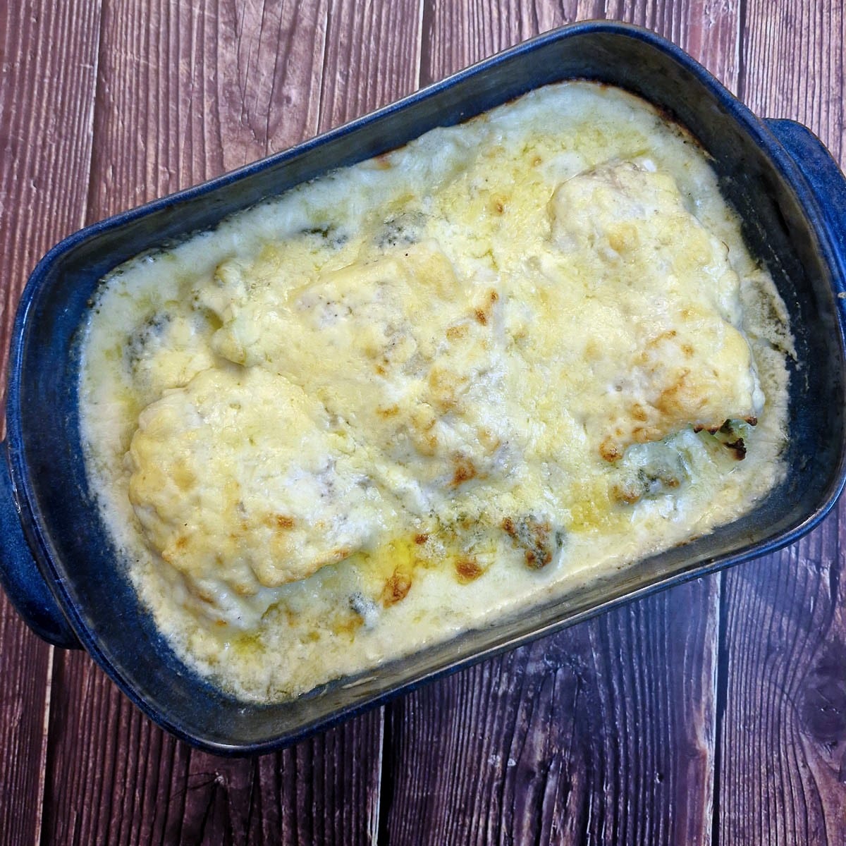 Overhead shot of a dish of cod and broccoli bake.