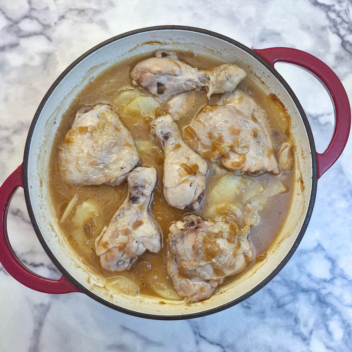 Chicken casserole after it has cooked for 45 minutes before being browned.