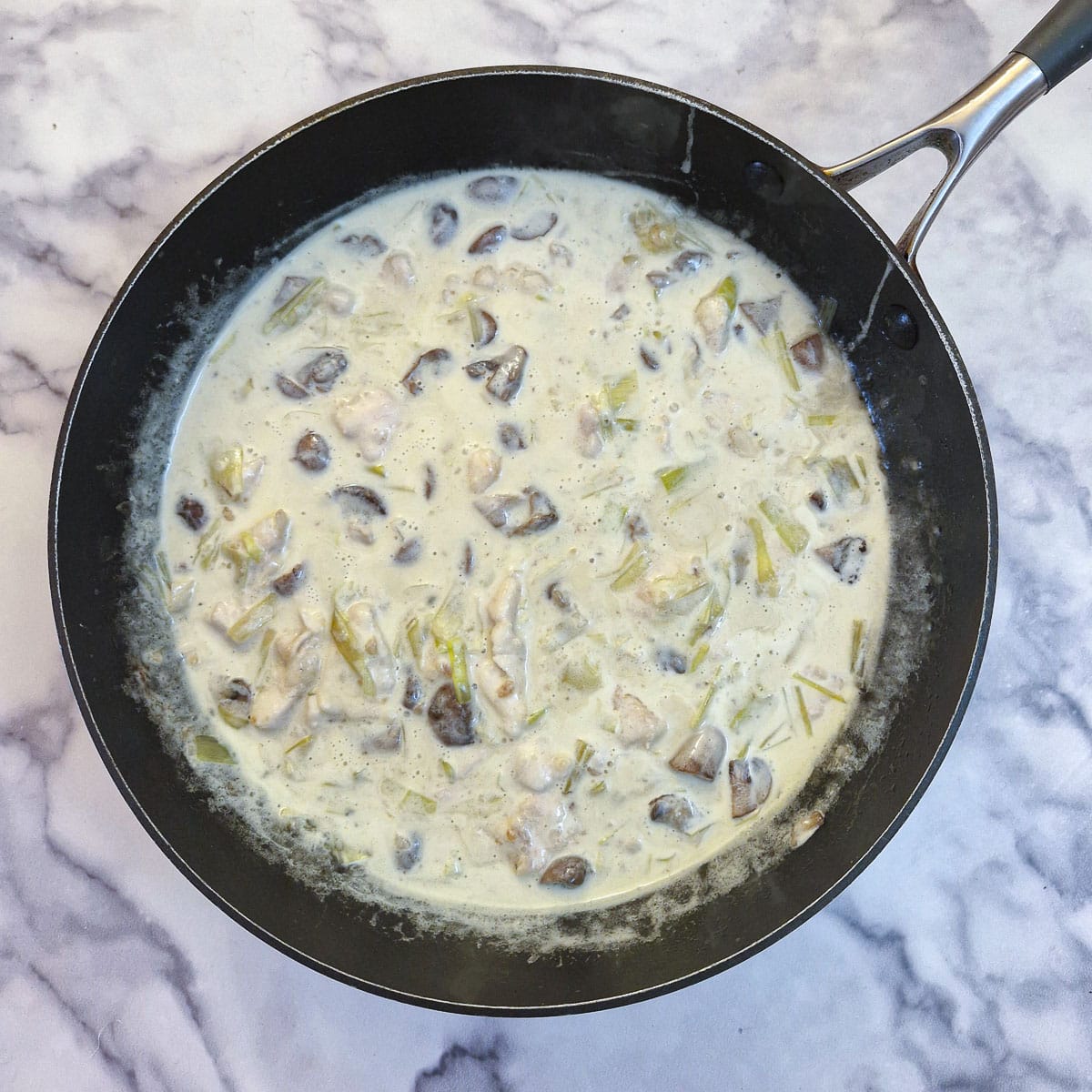 The chicken and mushroom filling with the addition of cream.