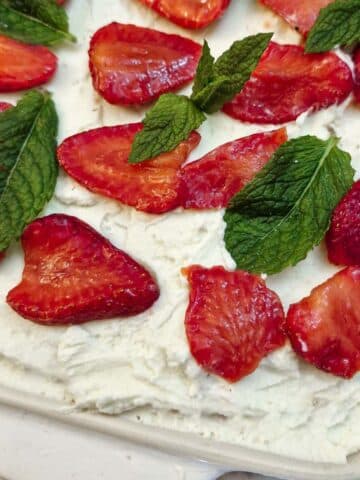 Close up of the top of a strawberry tiramisu.