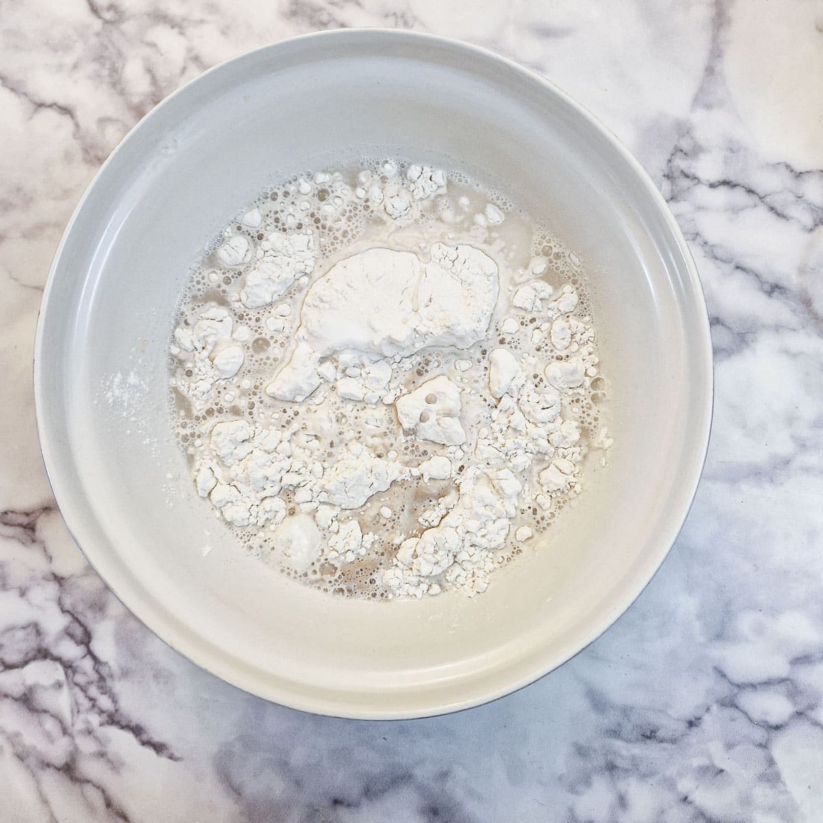 Focaccia ingredient in a mixing bowl.