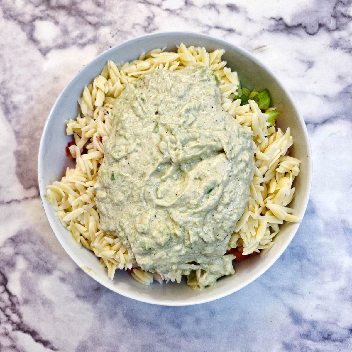 Avocado salad dressing added to crab salad.