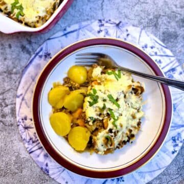 A plate of mince and potato bake
