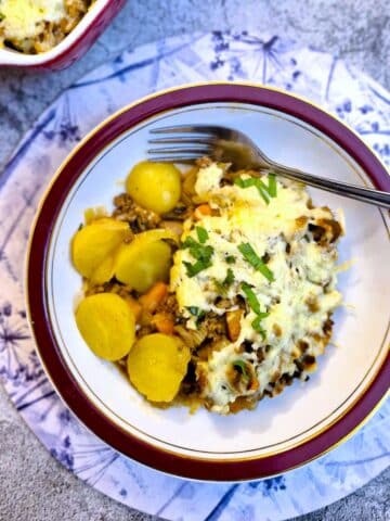 A plate of mince and potato bake.