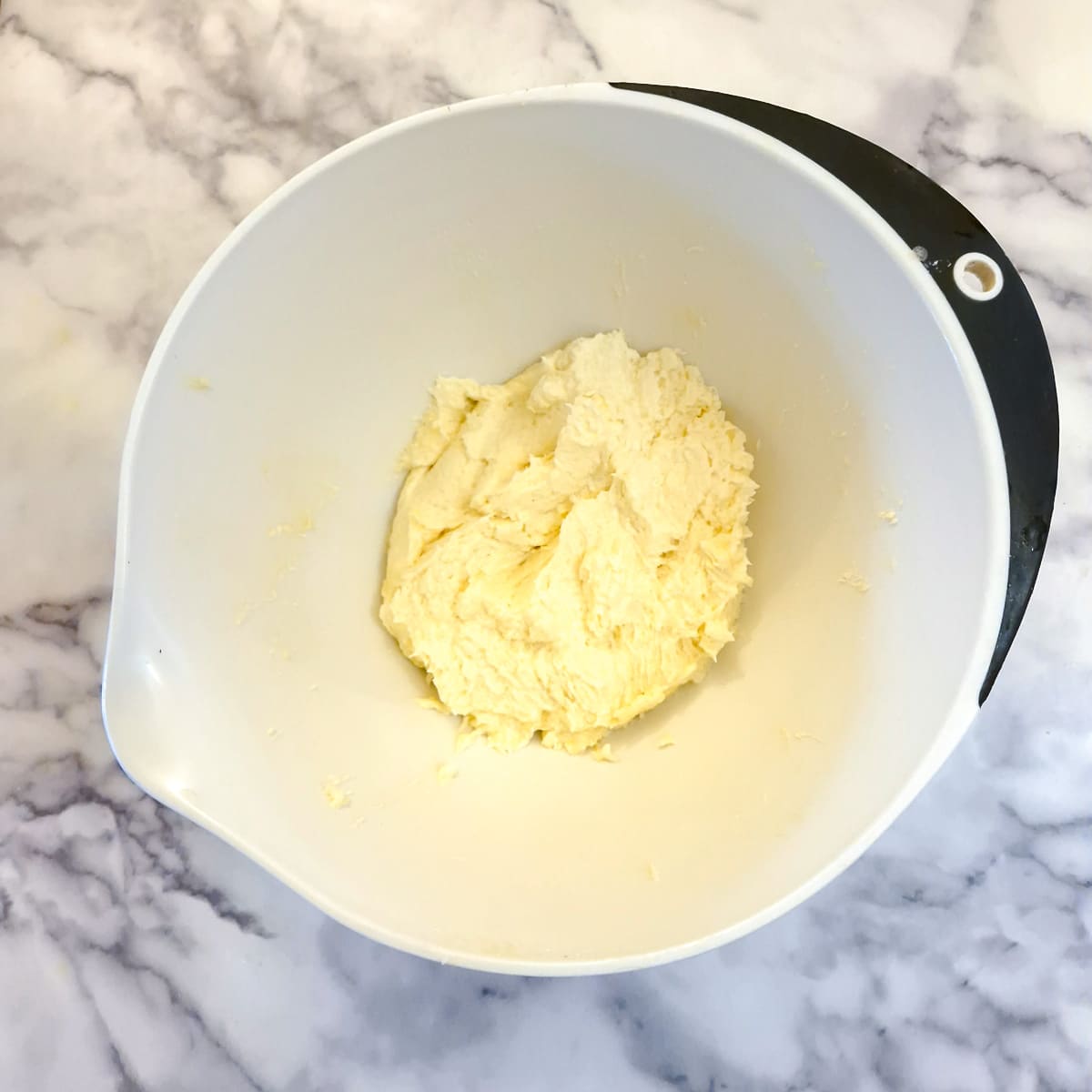 Eggs combined with creamed butter and sugar.