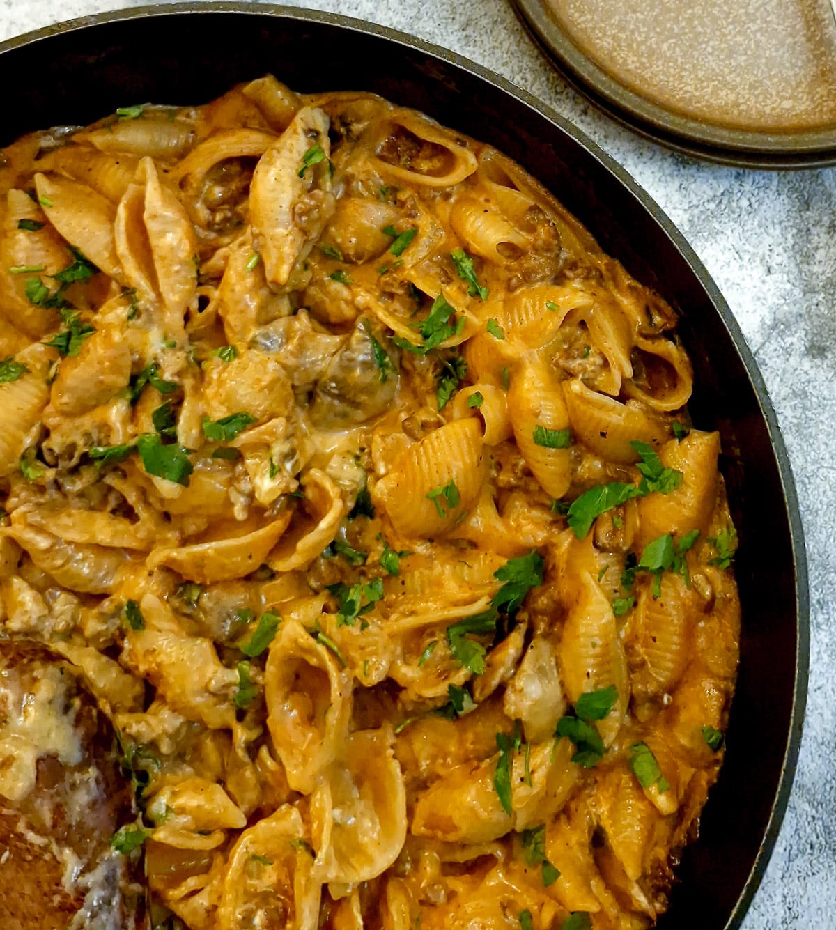 Close up of ground beef stroganoff and pasta.