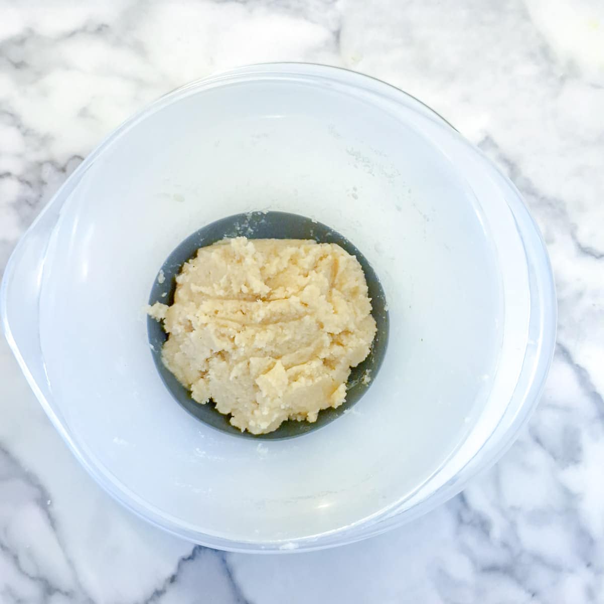 A ball of amaretti cookie dough.
