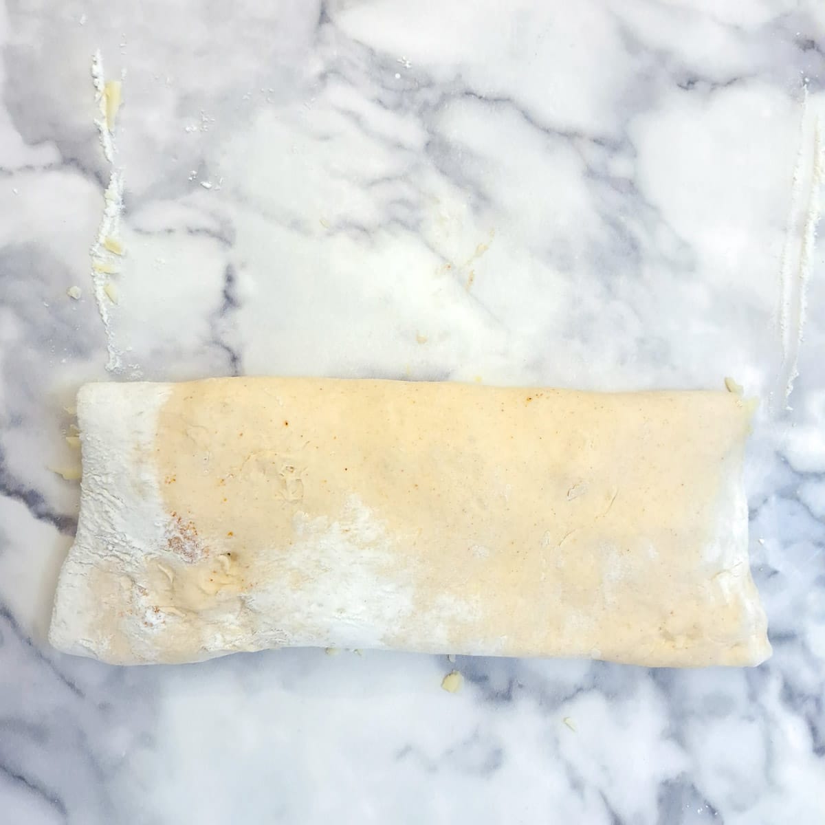 Pastry folded over the remaining cheese.