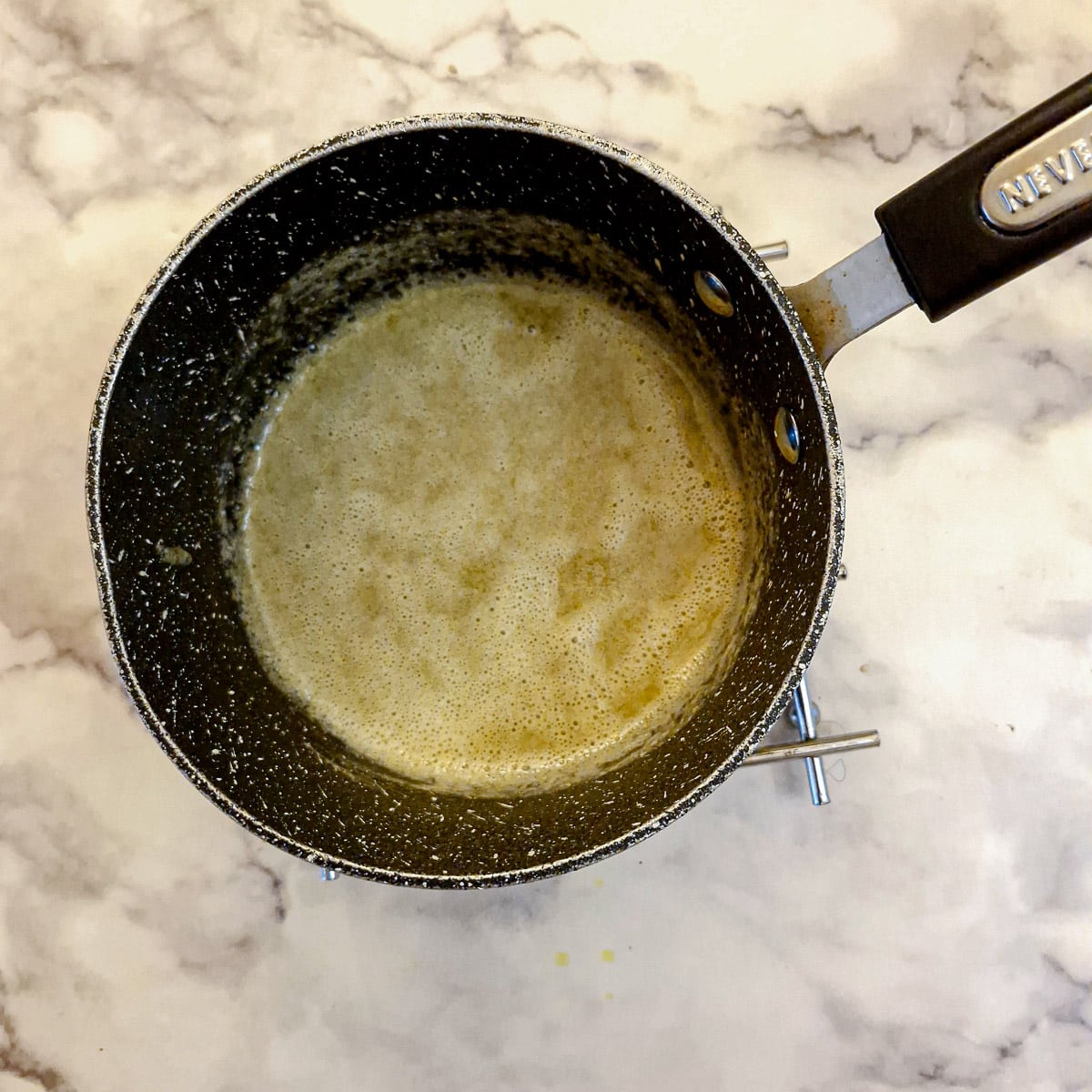 Melted butter and flour in a saucepan.