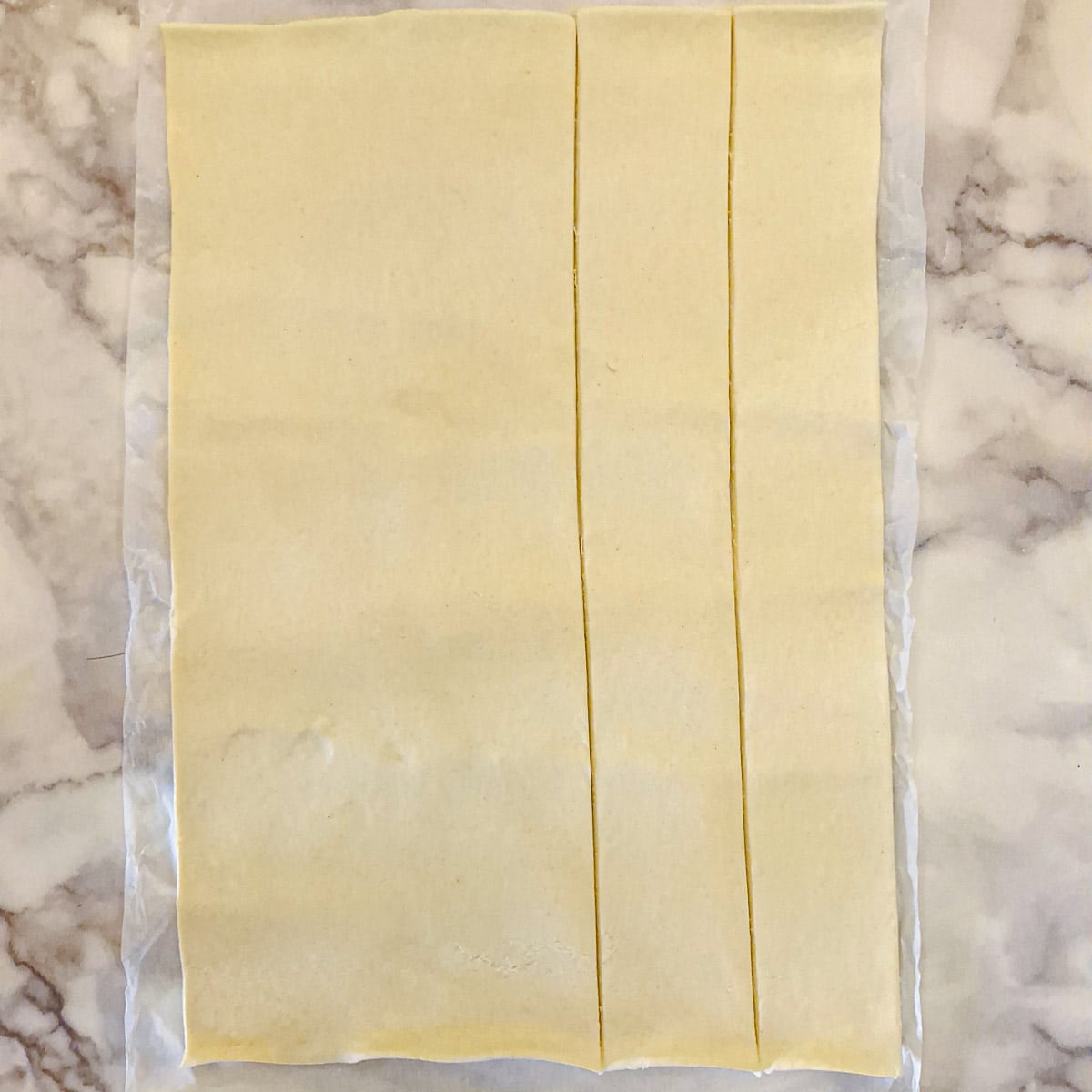 Puff pastry cut into strips.
