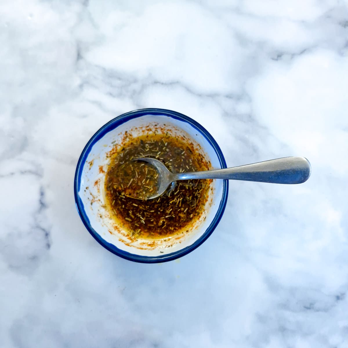 Marinade ingredients combined in a small bowl.