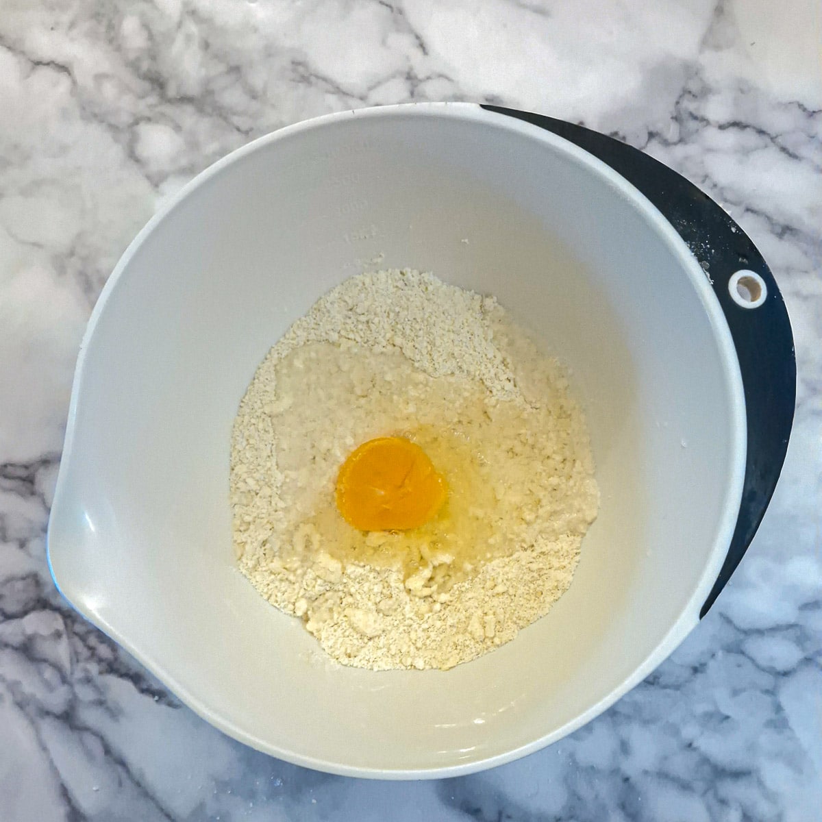 Egg and water added to the butter and flour mixture.