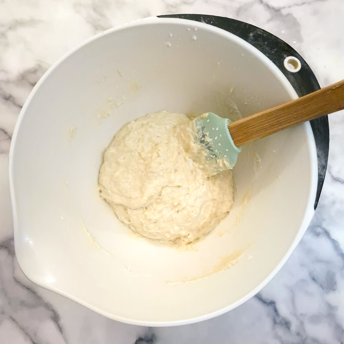 Eggs, milk and yoghurt combined with flour to form a sticky ball of dough.