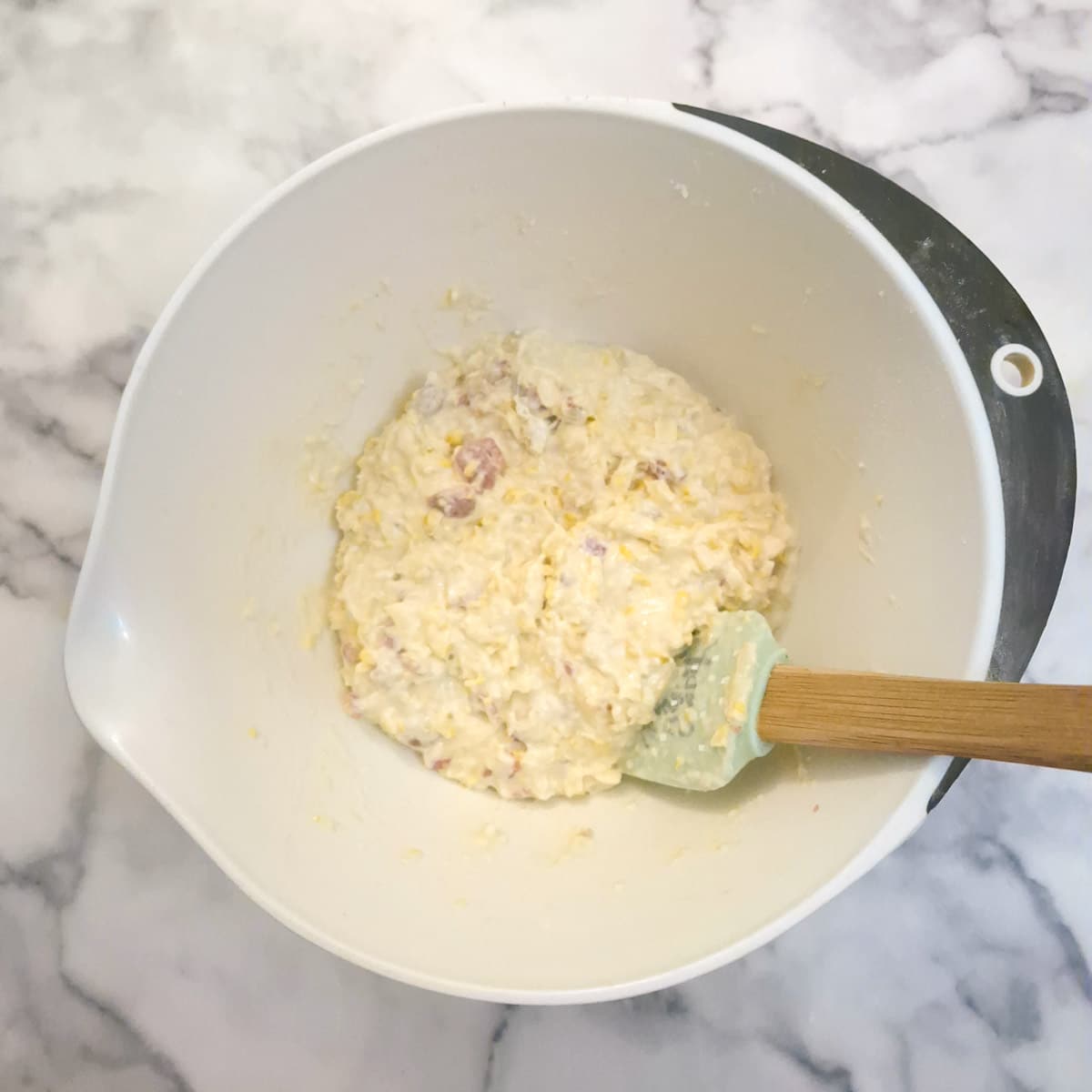Cheese, corn an bacon combined into the cornbread batter.