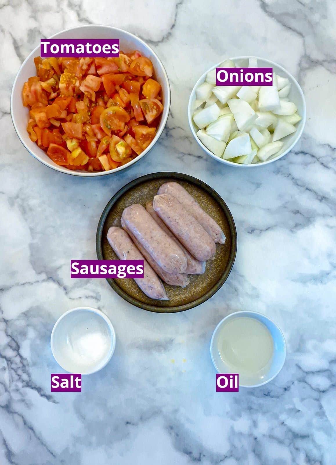 Ingredients for sausages in tomato and onion gravy.
