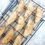 Italian almond biscotti on a cooling rack.