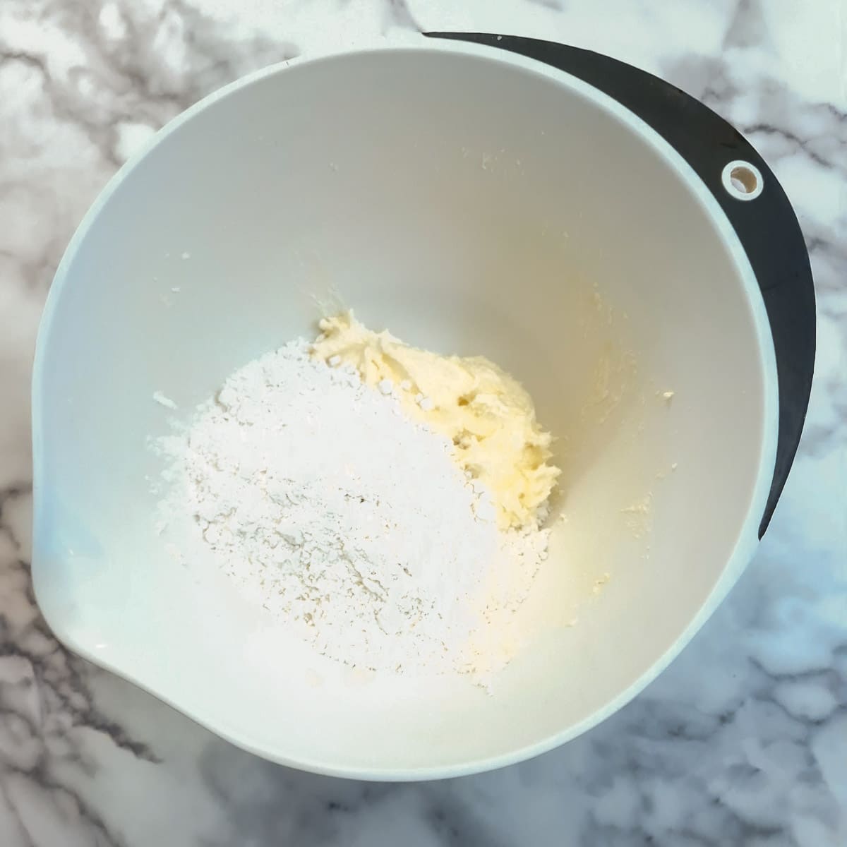 Flour added to the pastry mixture.