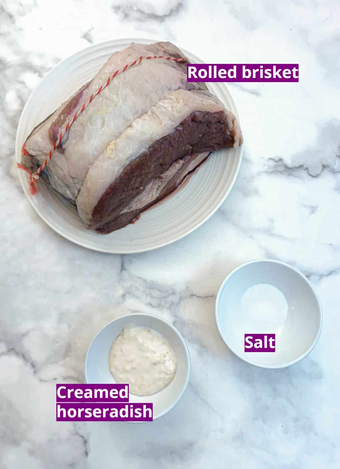 Ingredients for slow cooker rolled brisket in foil.