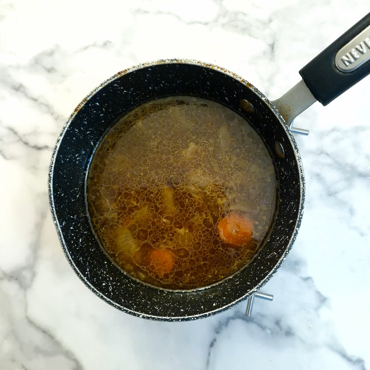 Gravy ingredients in a saucepan.
