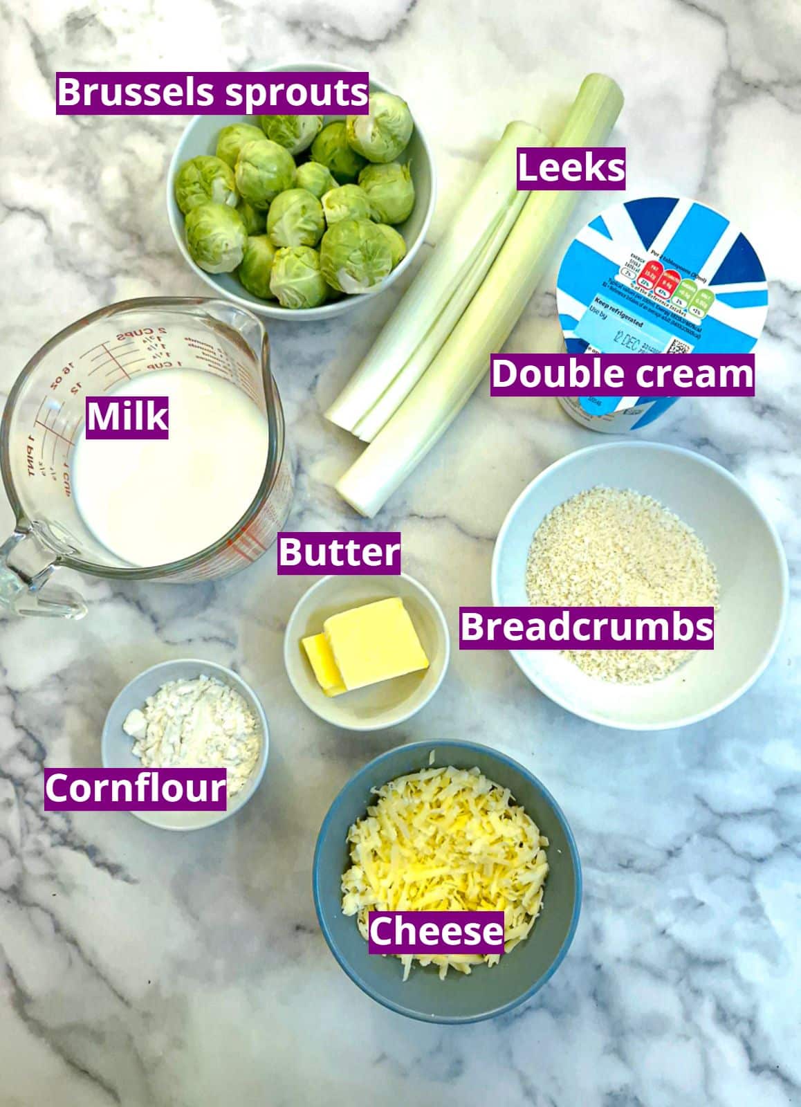 Ingredients for making creamy leek and brussels sprouts casserole.