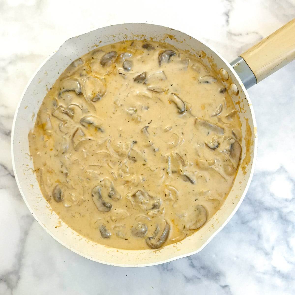 A pan of thickened hunter's sauce.