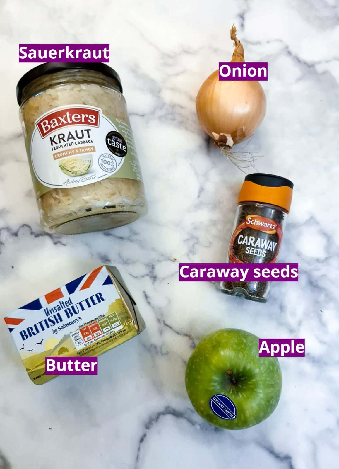 Ingredients for making sauerkraut with apple.