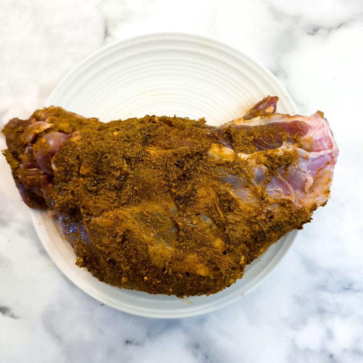 Leg of lamb rubbed with a curry spice mix.