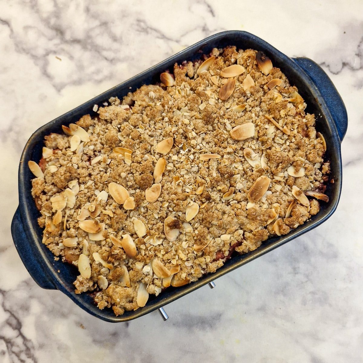 A baked blackberry and apple crumble.