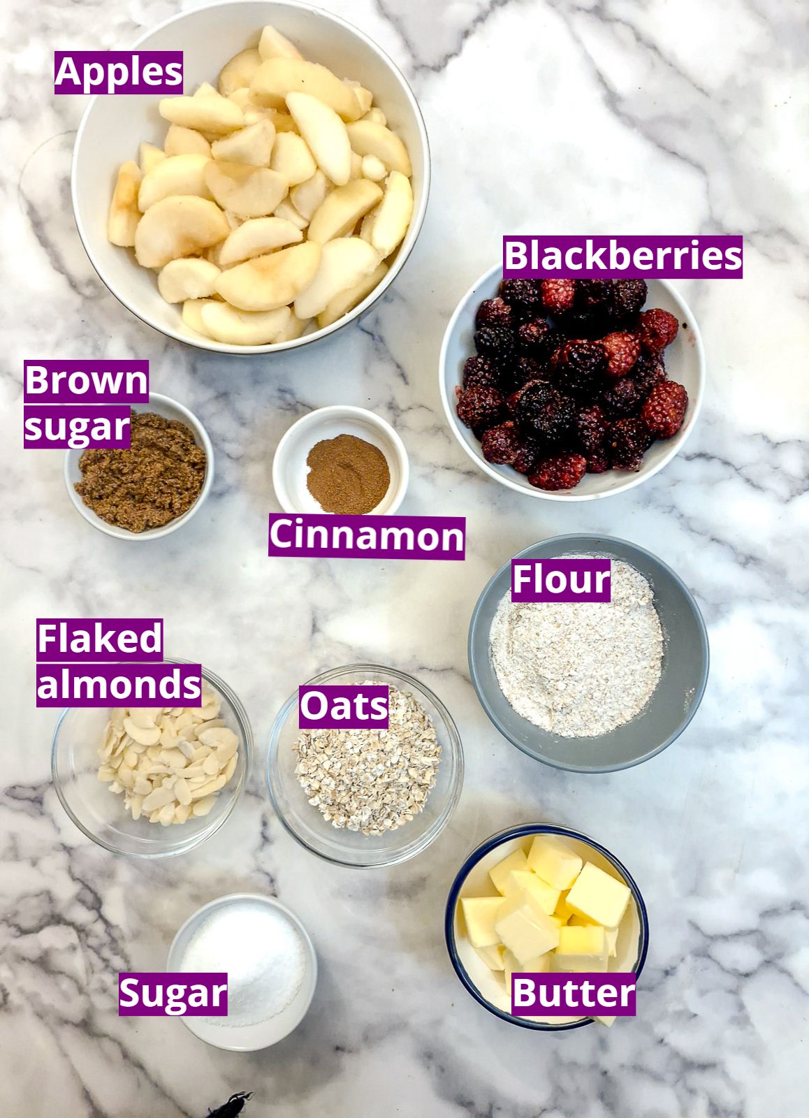 Ingredients for making apple and blackberry crumble.